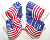 Large hair bow with American flag design on a white background